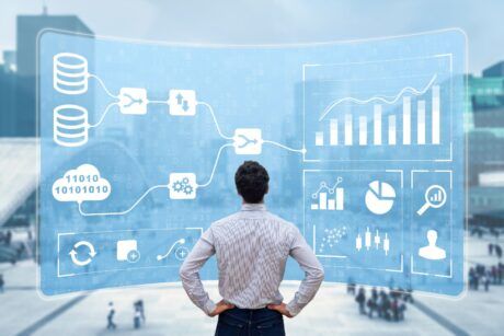 A man analyzing data on a futuristic interface, utilizing advanced data analysis tools for insights.