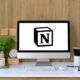 Notion logo on computer screen, displaying code. Learn how to use Notion for efficient organization