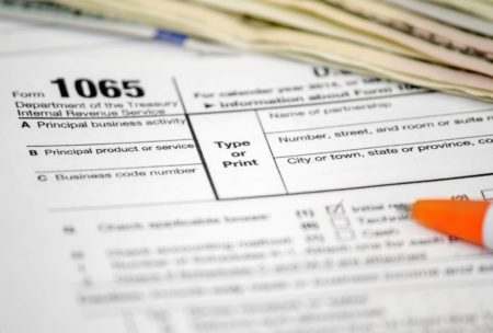 Learn to enter tax data for a partnership into tax Form 1065