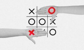 hands displaying a tic tac toe board designed with a python theme